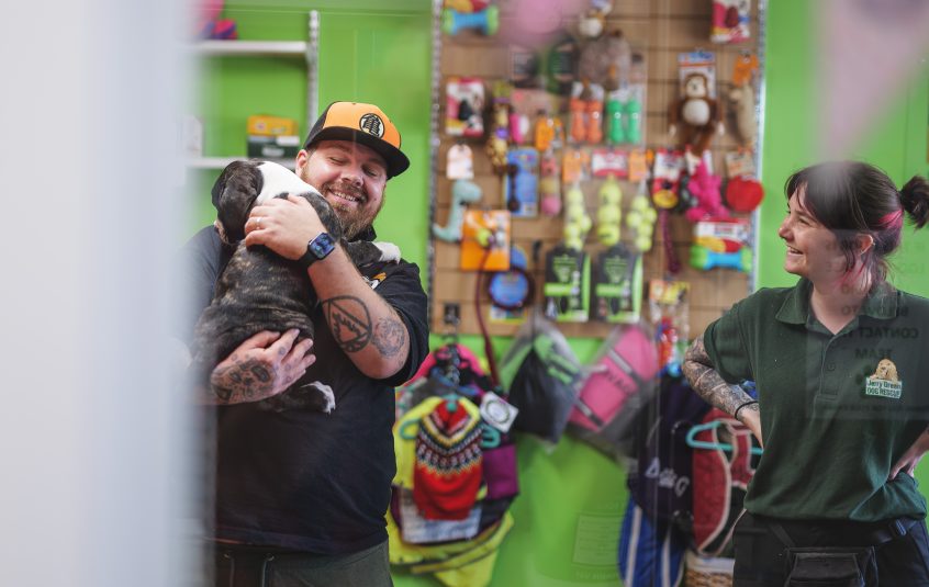 Person holding dog